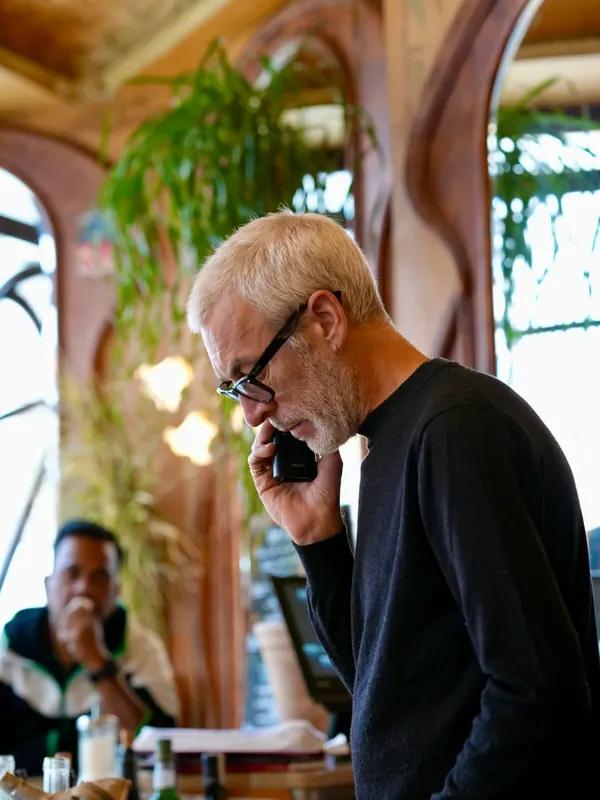 At the bar, The phone rings